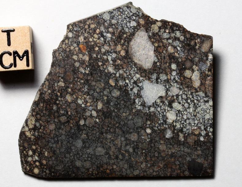 9.7 gram part slice.   Chondrite-ung.jpg
